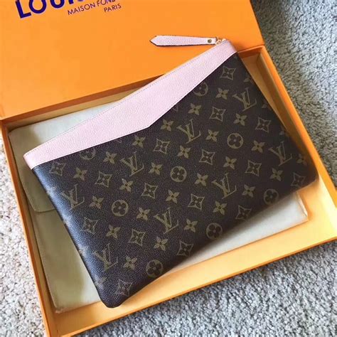 louis vuitton daily pouch monogram empreinte|louis vuitton pouch wristlet.